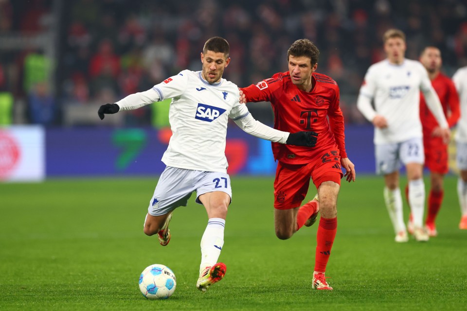 Soccer players vying for the ball.