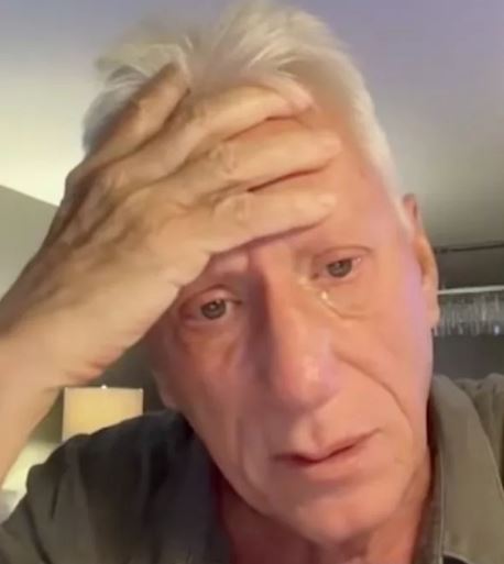 Actor James Woods appearing distressed.