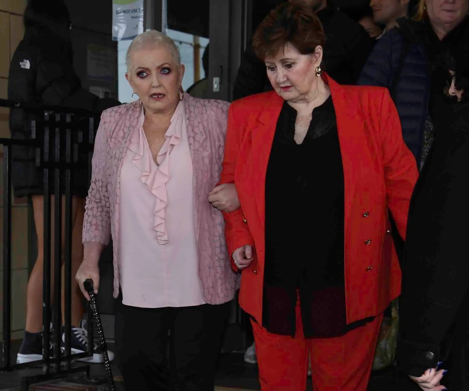 Linda and Denise Nolan at a blue plaque unveiling.