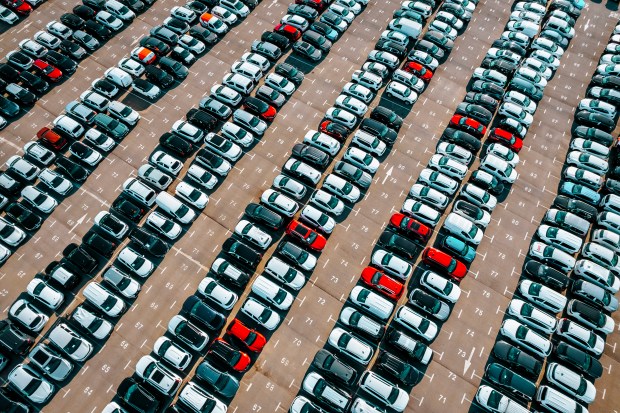 Aerial view of a large car lot.