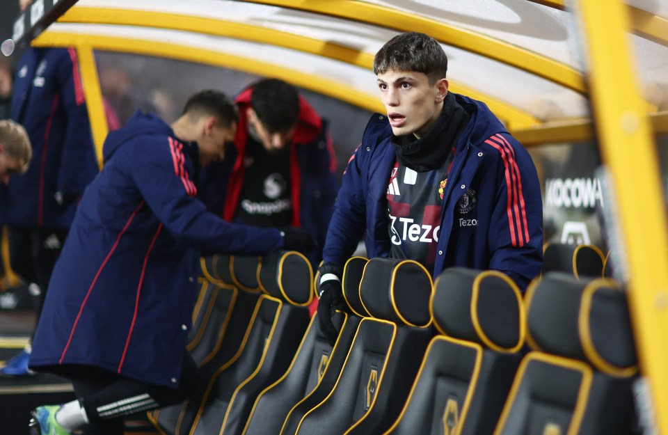 Alejandro Garnacho of Manchester United on the bench before a Premier League match.