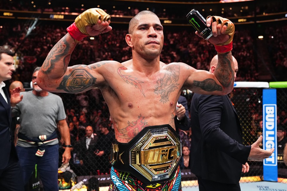 Alex Pereira of Brazil celebrates his UFC light heavyweight championship TKO victory.