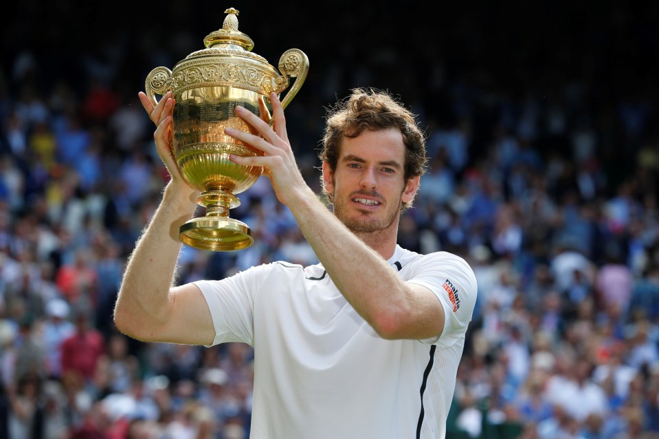 Andy Murray holding the Wimbledon trophy.