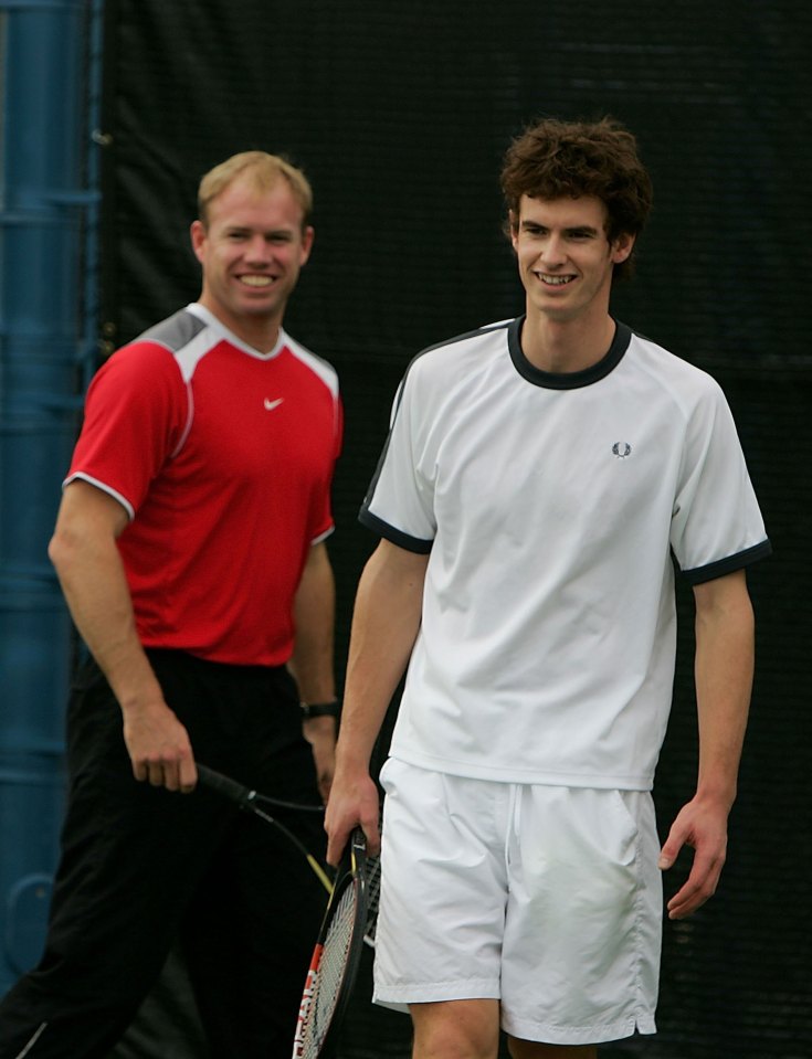 Andy Murray of Great Britain training with his coach.