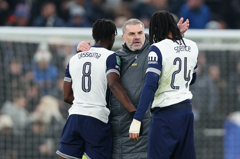 Ange Postecoglou with Tottenham Hotspur players Yves Bissouma and Djed Spence.