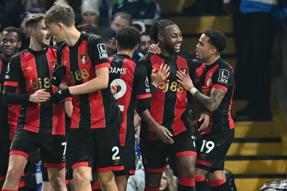 Bournemouth soccer players celebrating a goal.