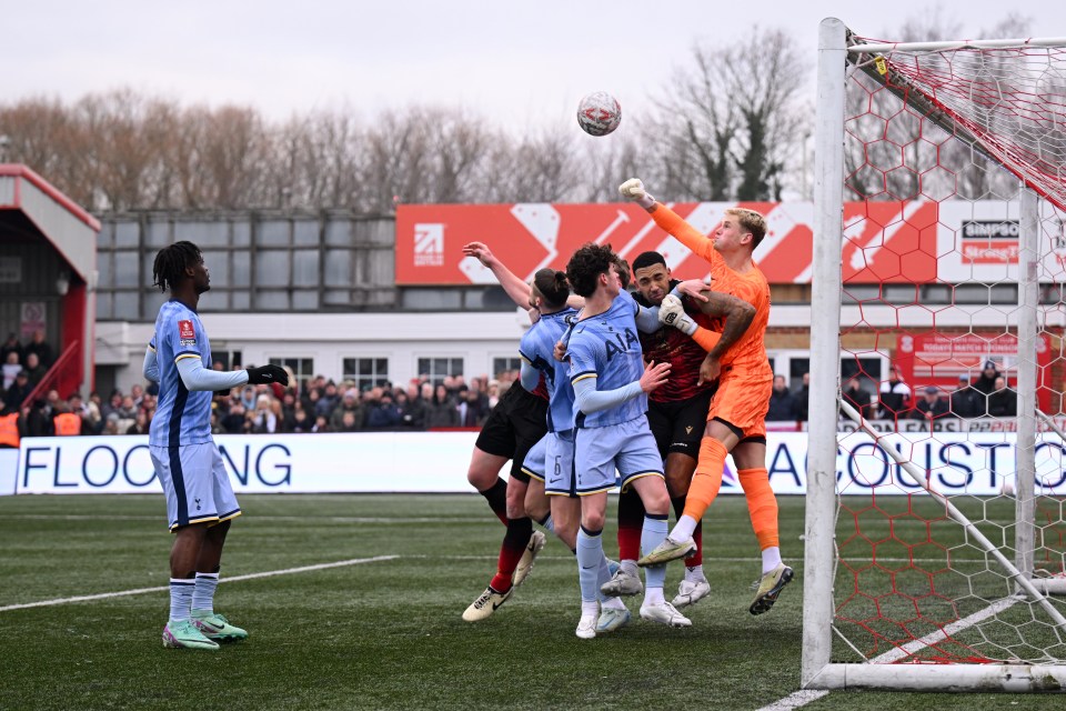 Soccer goalie making a save.