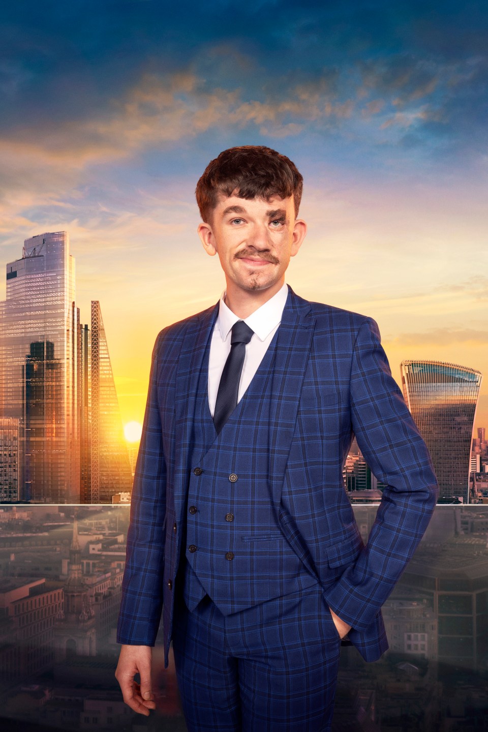 Jonny from The Apprentice, in a blue suit, against a London cityscape.