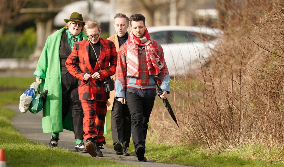 Jayde Adams and Ian Watkins arriving at The Vivienne's funeral.