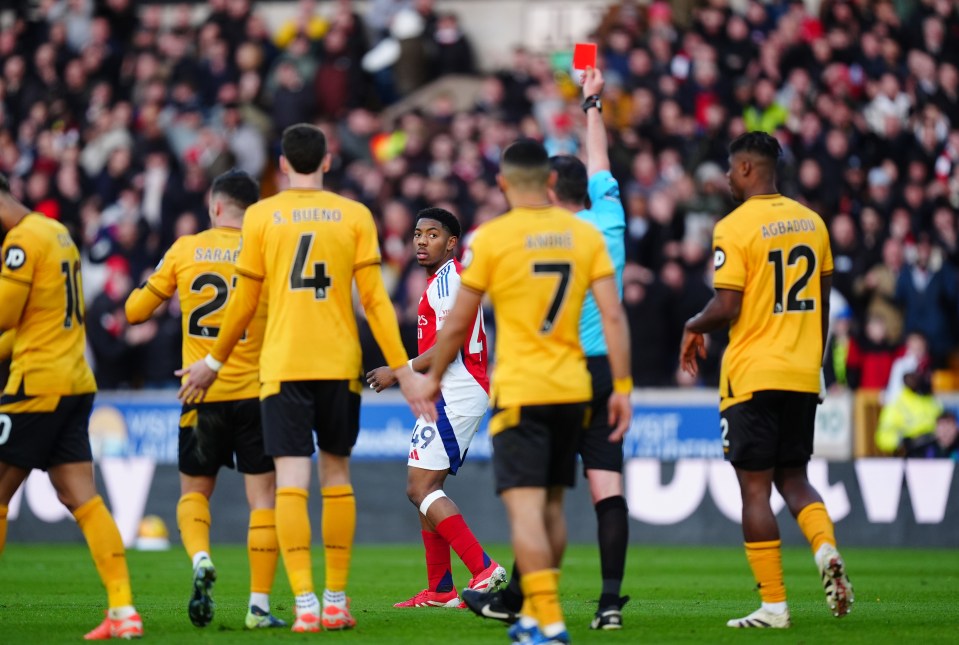 Arsenal's Myles Lewis-Skelly receives a red card.