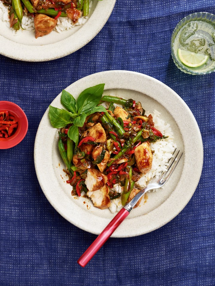 Chicken stir-fry with rice and green beans.