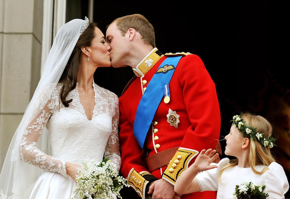 Prince William and Kate Middleton kissing on the Buckingham Palace balcony after their wedding.