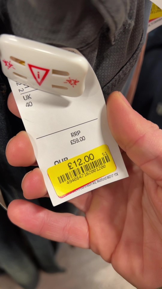 TK Maxx clothing tag showing a sale price of £12.00, reduced from £59.00.