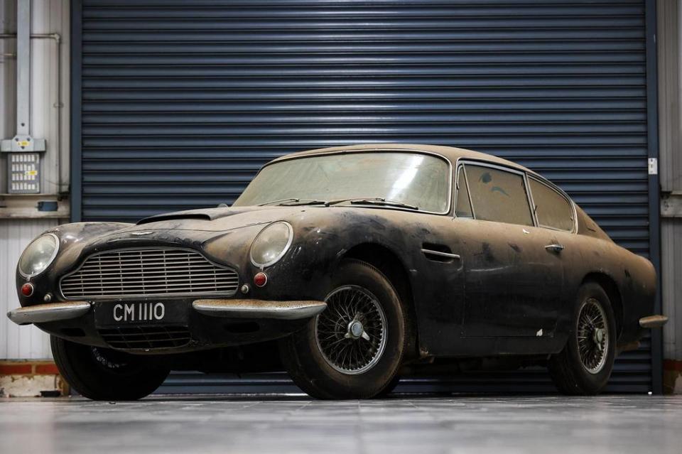 Dusty Aston Martin DB6 sports car.