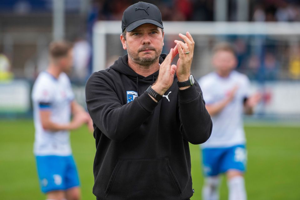 Stephen Clemence, Barrow manager, clapping.