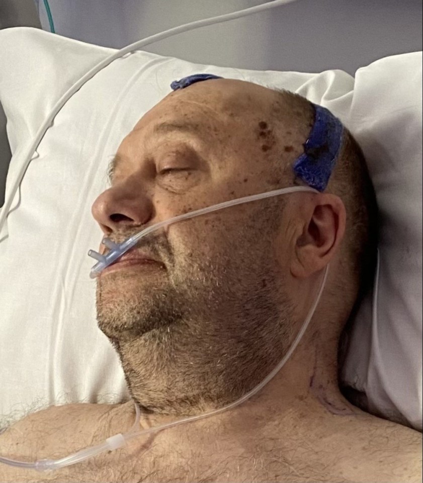 Man in hospital bed post-brain surgery.