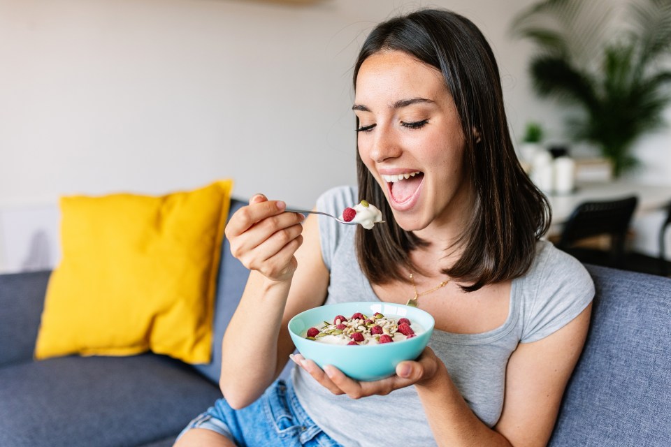 Woman enjoying a healthy breakfast.