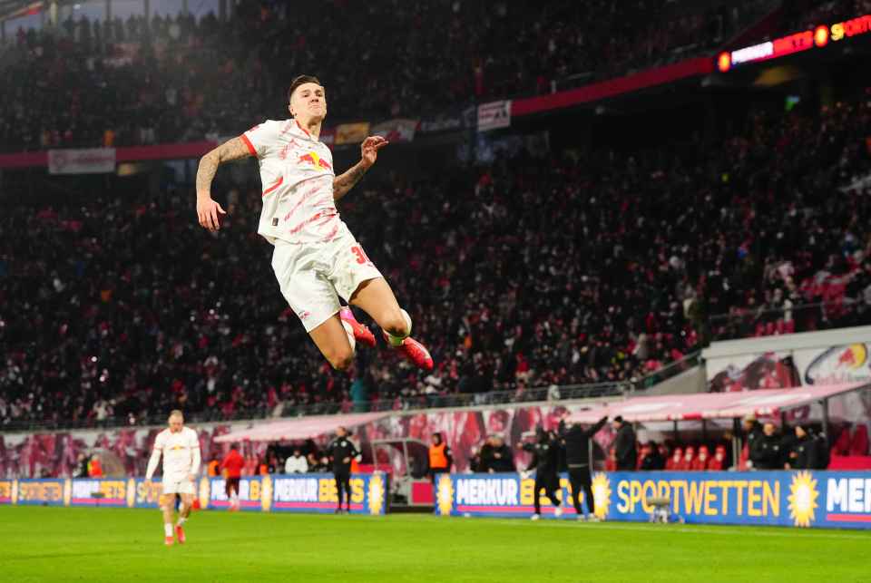 Benjamin Sesko of RB Leipzig celebrates a goal.