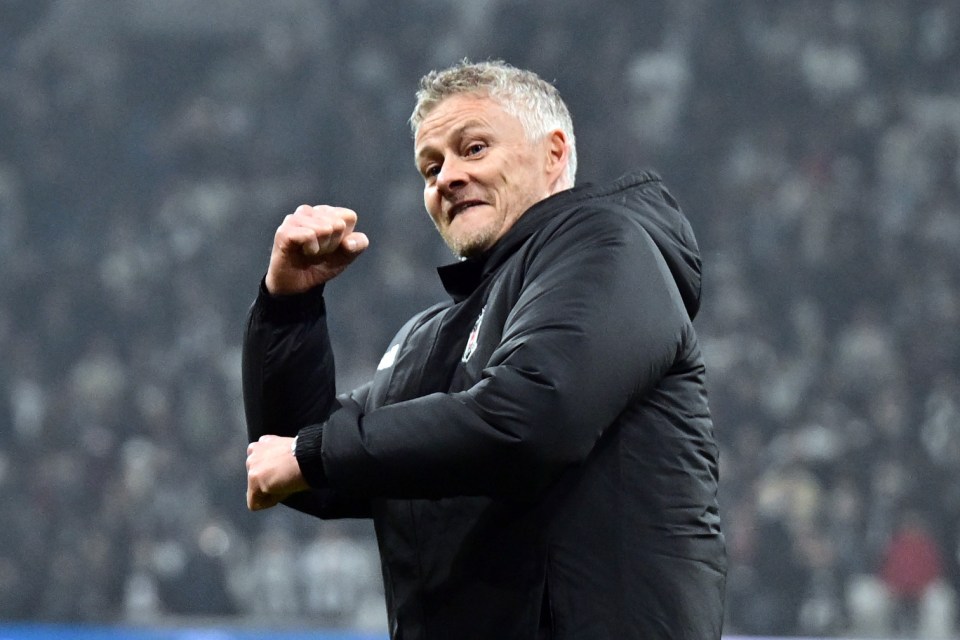 Ole Gunnar Solskjaer celebrates with a fist pump.