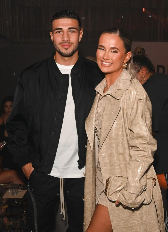 Tommy Fury and Molly-Mae Hague at a fashion show.