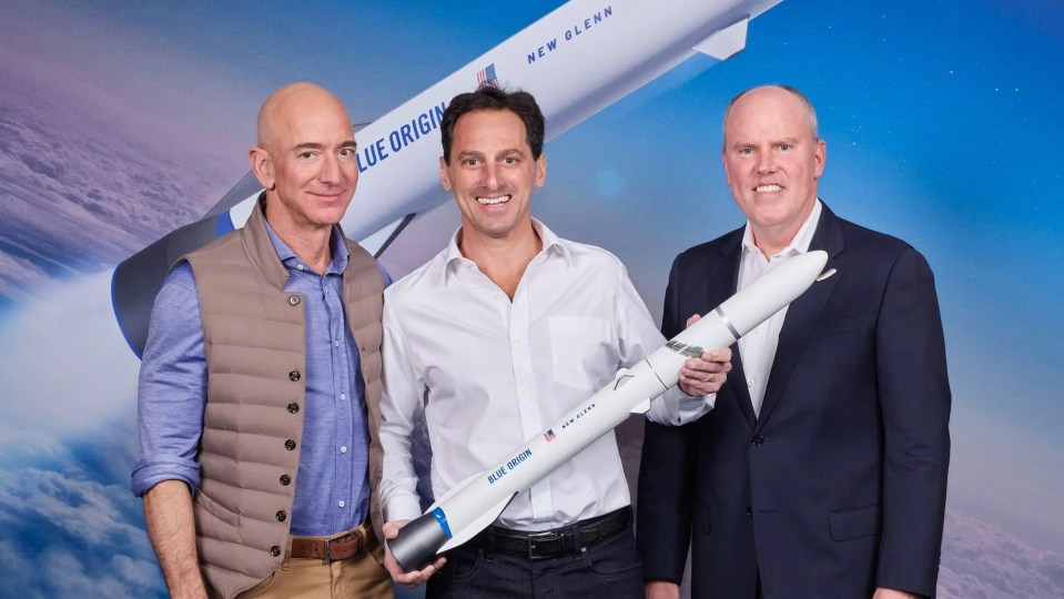 Jeff Bezos, left, recently won a contract from Telesat that will see a satellite constellation launched using Blue Origin's New Glenn rocket