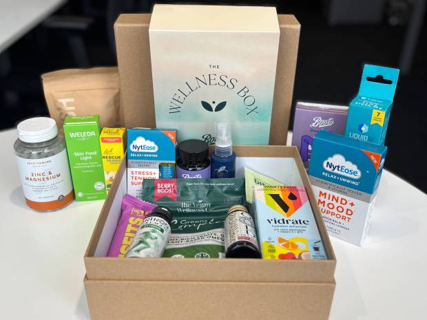 Wellness box with various supplements and beauty products.