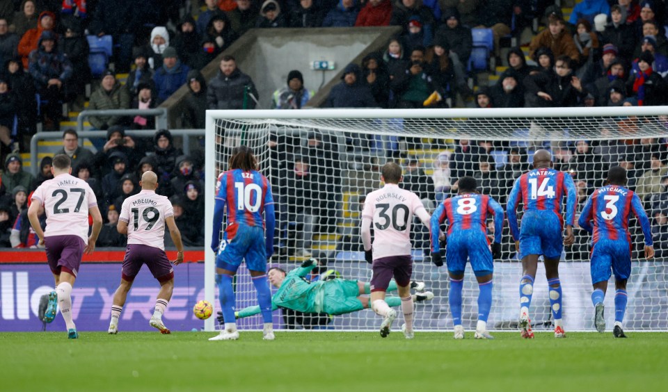 Bryan Mbeumo misses a penalty kick during a soccer match.