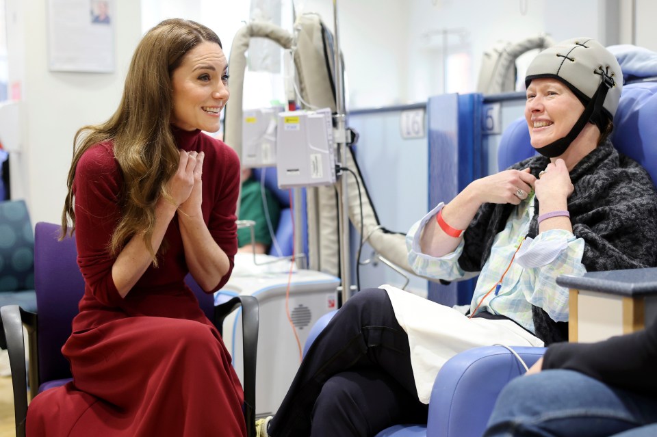 Princess Kate speaking with a cancer patient at a hospital.