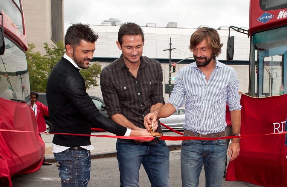 David Villa, Frank Lampard, and Andrea Pirlo at a ribbon-cutting ceremony.