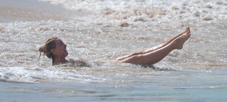 Claire Sweeney enjoying a swim in the ocean.