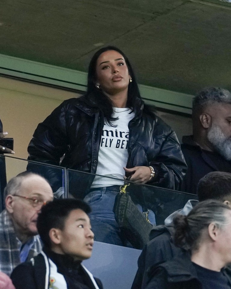 Ashlyn Castro with Jude Bellingham's family in a VIP box at a Real Madrid game.