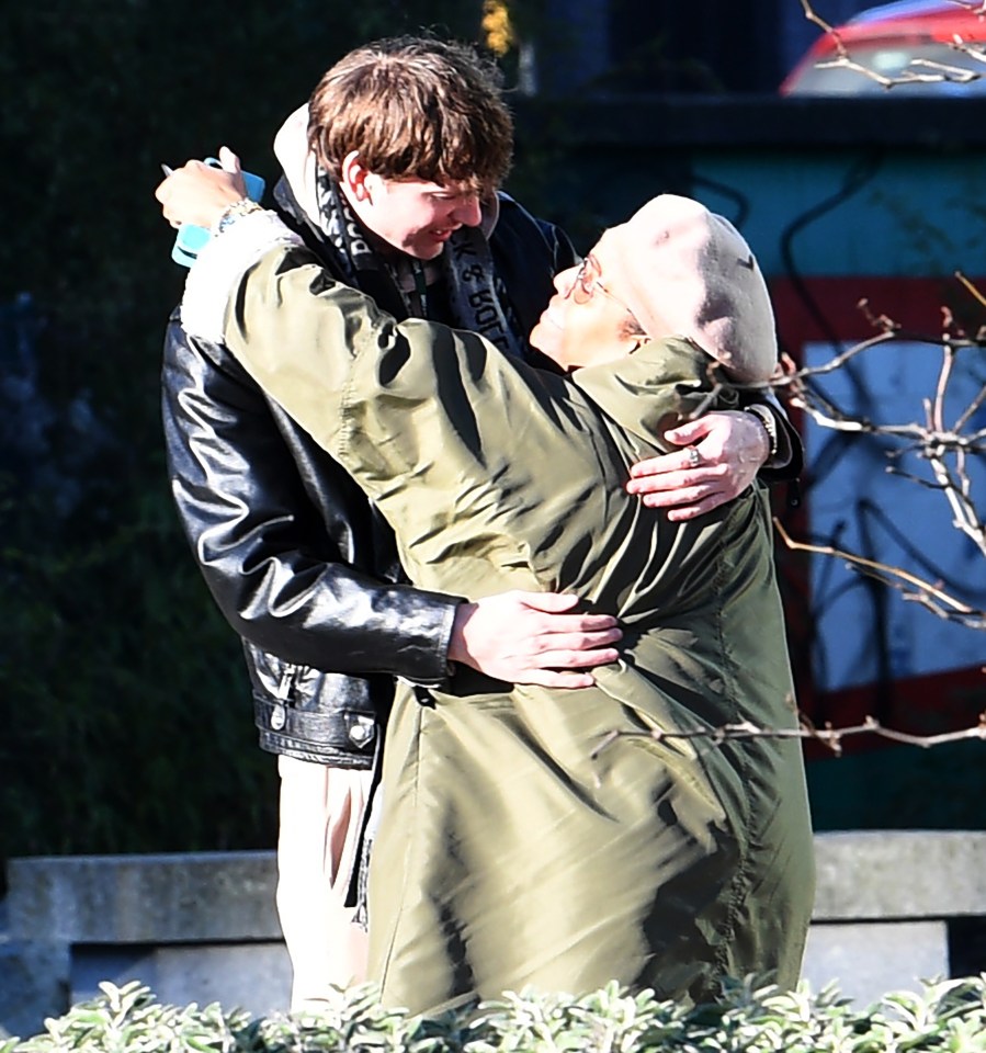 Alison Hammond and David Putman embracing.