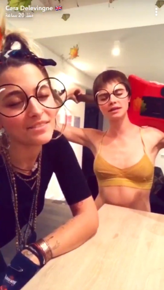 Cara Delevingne and Paris Jackson wearing glasses.