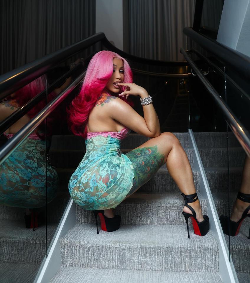 Cardi B channels her inner mermaid with new pink hair and a pretty pastel dress