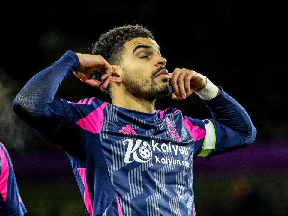 The England star put his fingers in ears as his former fans gave him stick at Molineux