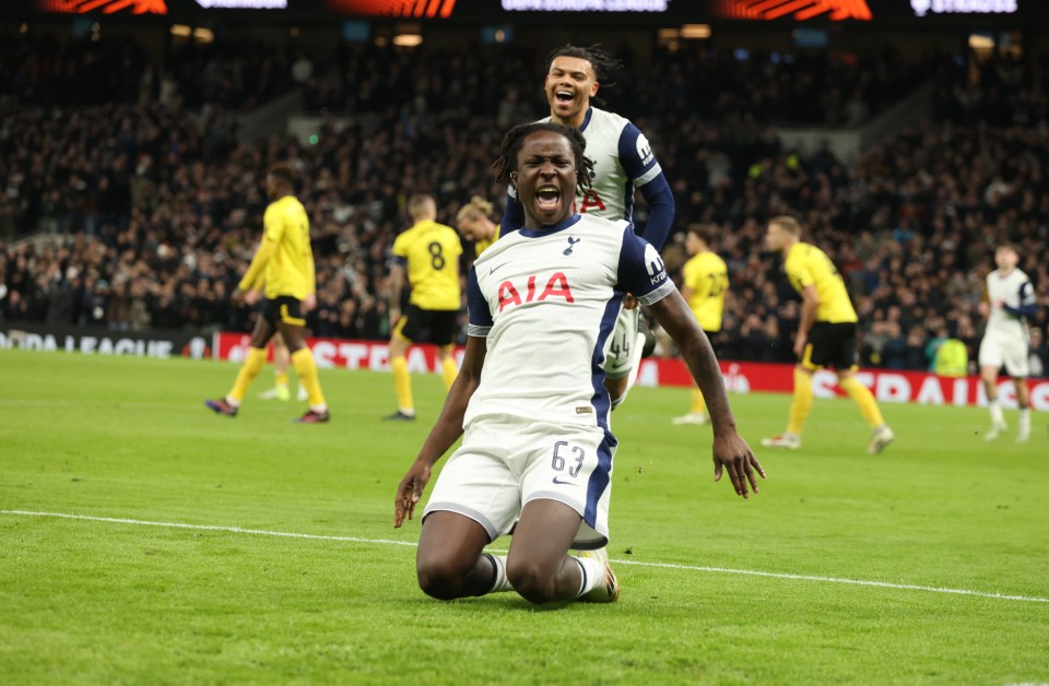 Soccer player celebrating a goal.