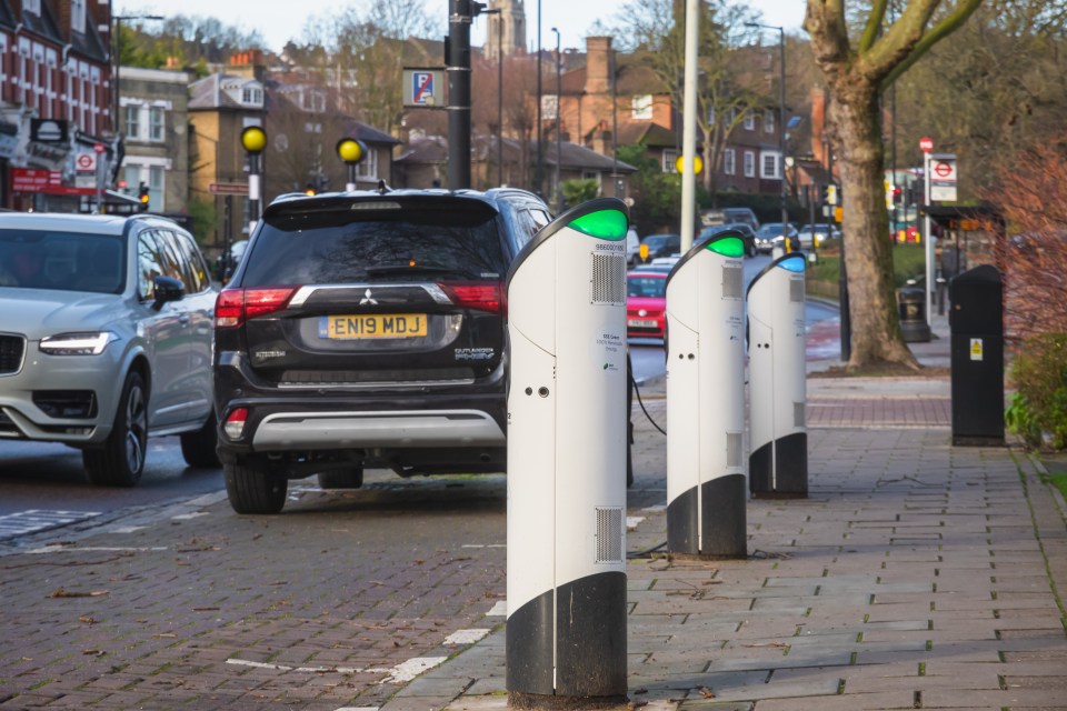 Electric vehicle charging station on a street in London.