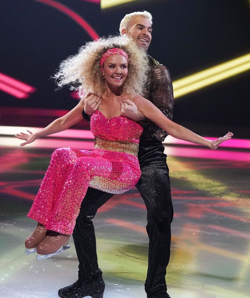 Charlie Brooks and Eric Radford ice skating.