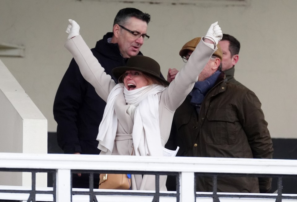 Geri and Christian Horner celebrating their horse's win.