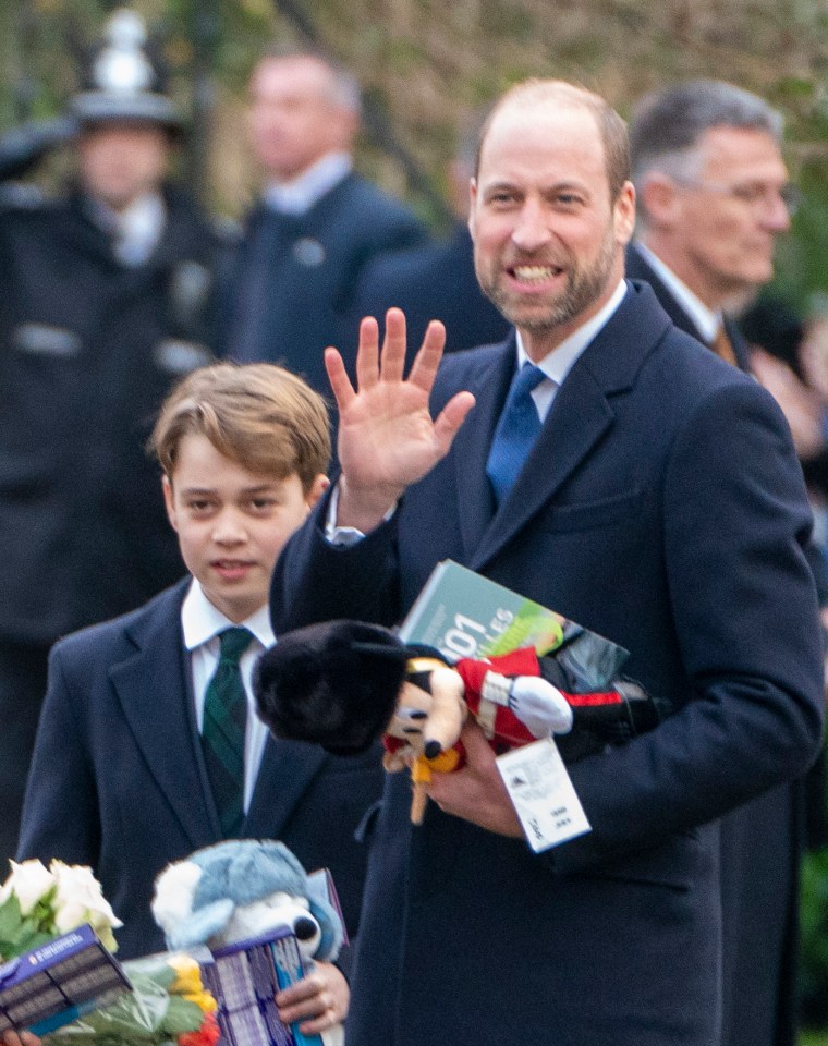 Prince William and Prince George waving at Sandringham Church on Christmas Day.