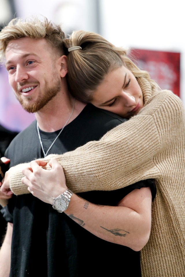 LONDON, ENGLAND - DECEMBER 04: Sam Thompson and Zara McDermott  stop by New Look Oxford Street to get all their last-minute Christmas gifts for friends and family on December 04, 2019 in London, England. (Photo by Mark Boland/Getty Images for New Look)