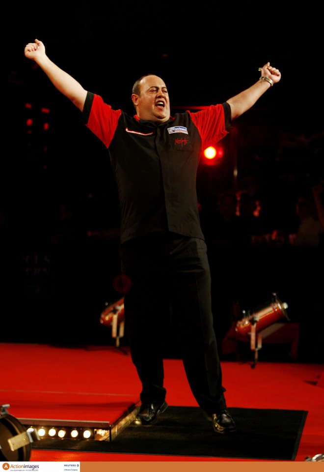 Wynand Havenga celebrating a darts win.