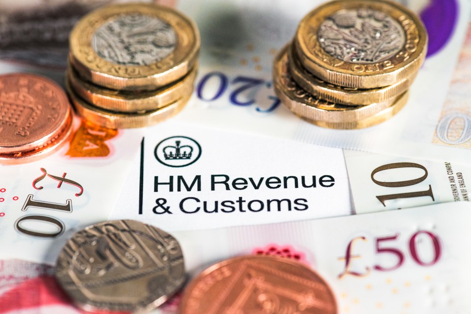 British banknotes, coins, and an HM Revenue & Customs tax form.