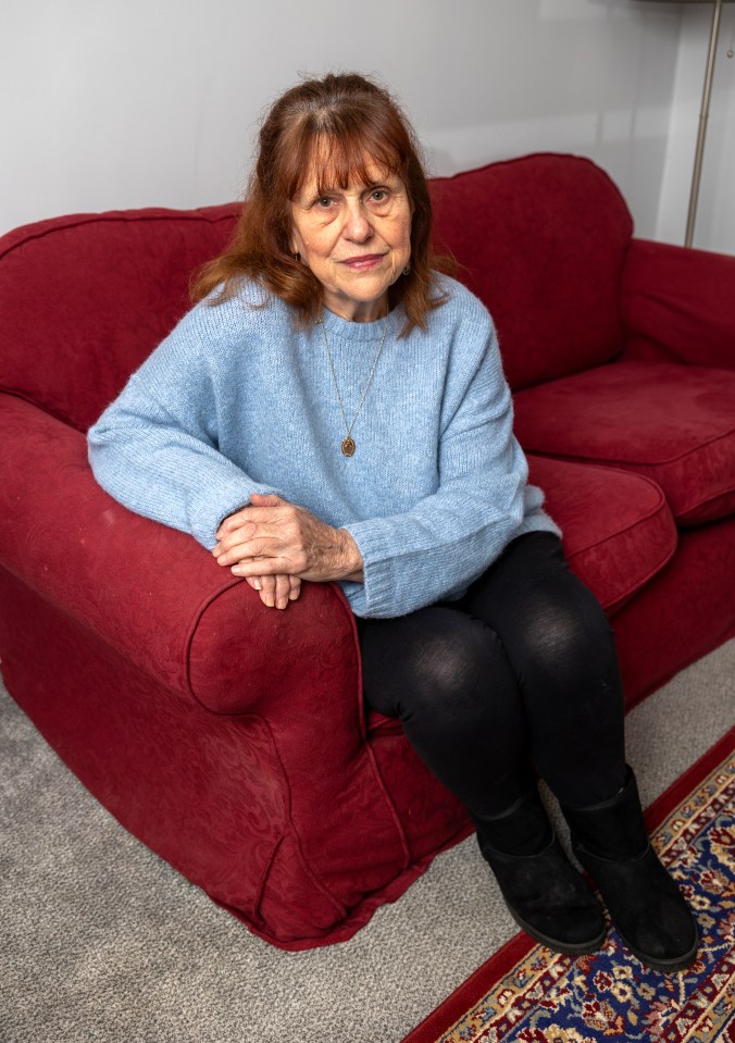 Margaret Mizen, seated on a red couch, discusses her son's murder.