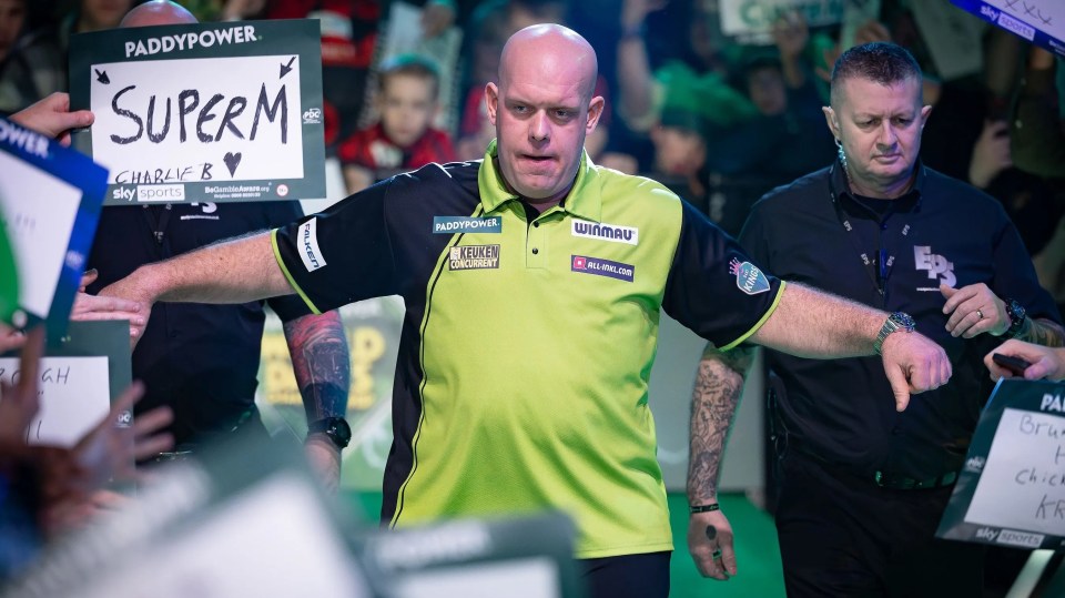 Michael van Gerwen walking on stage before a World Darts Championship quarter-final match.