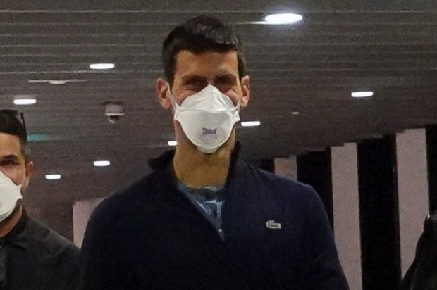 Novak Djokovic at Melbourne Airport after his visa was canceled.