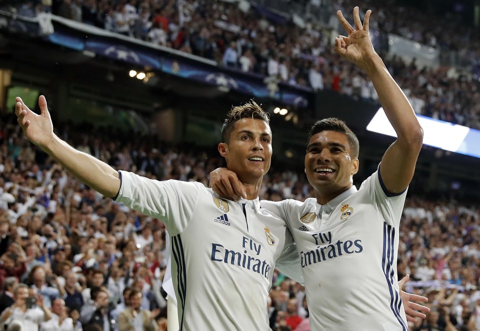 Cristiano Ronaldo and Casemiro celebrate Real Madrid's third goal.