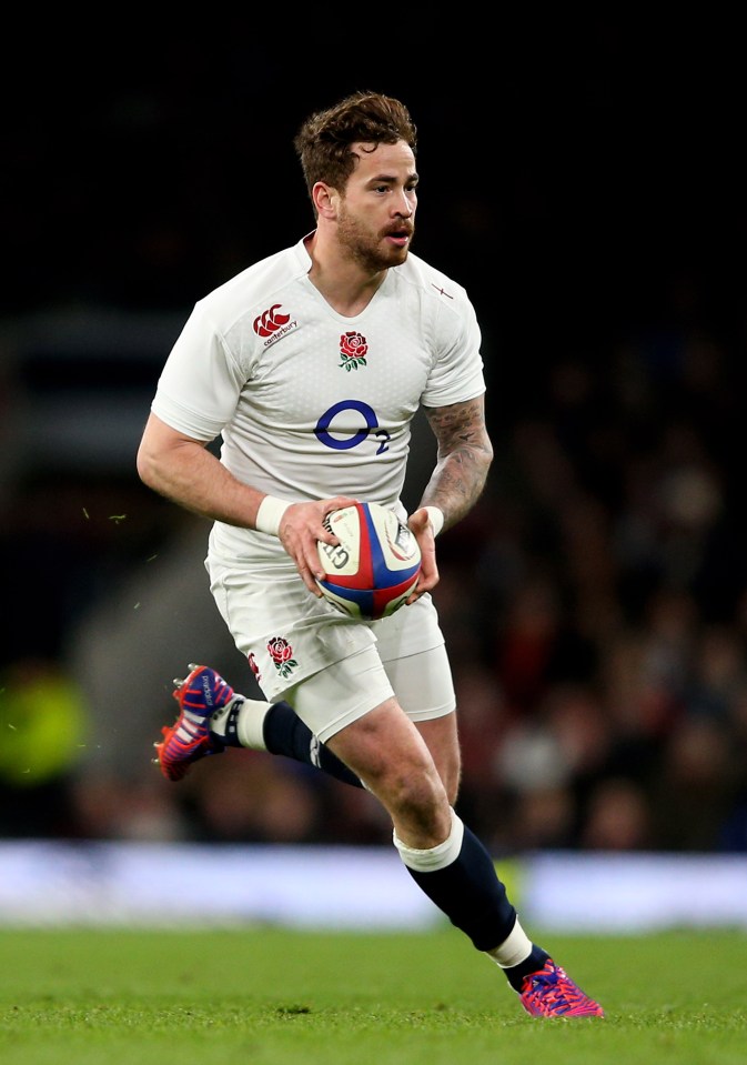 Danny Cipriani of England running with the rugby ball.