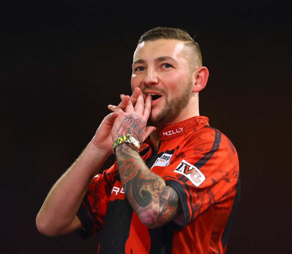 Nathan Aspinall at a darts match.