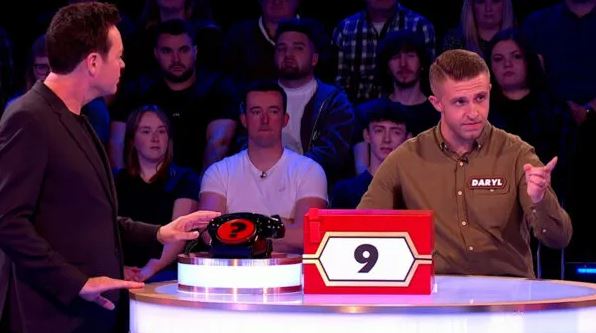 Deal or No Deal contestant choosing box number 9.